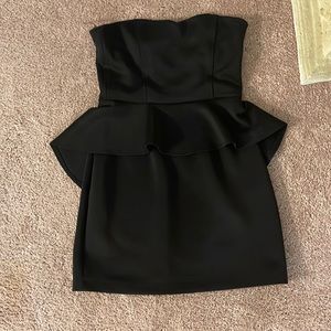 The brand is A’GACI. Black Strapless peplum dress. Size large.